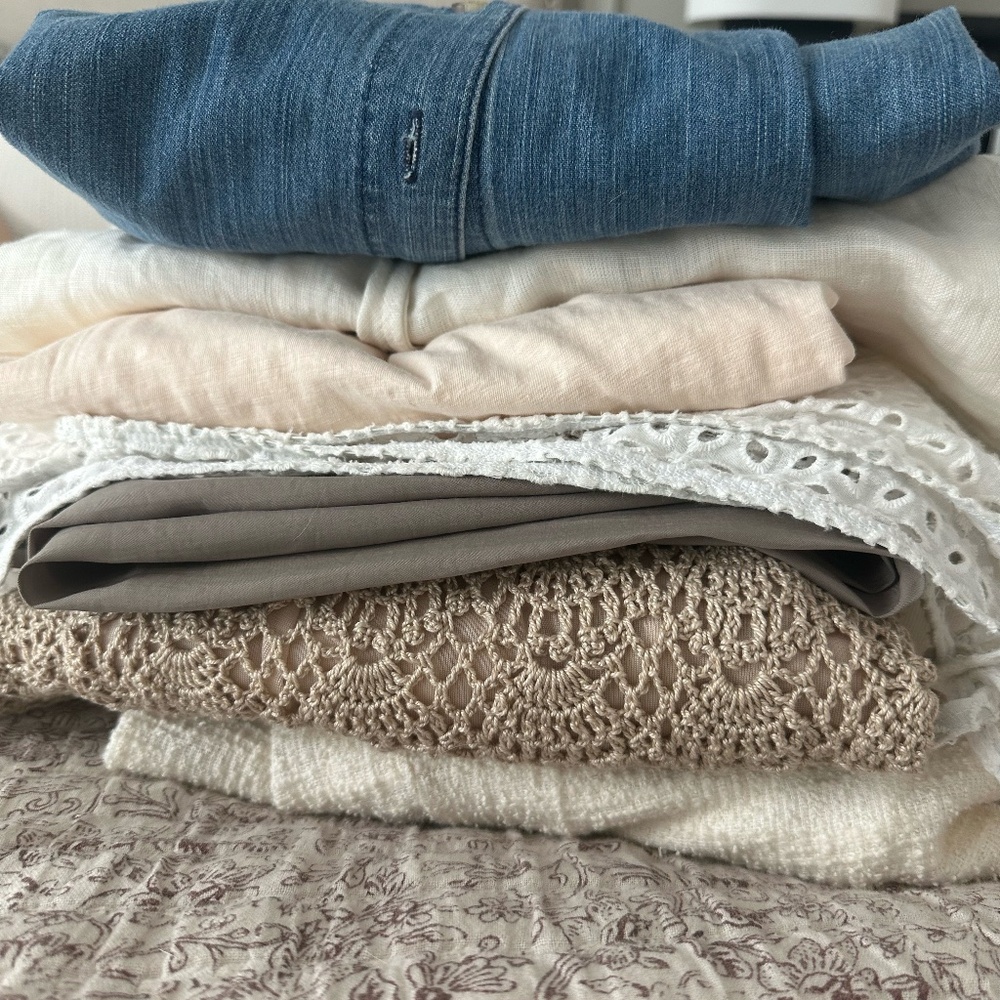 Stack of Designer Clothes